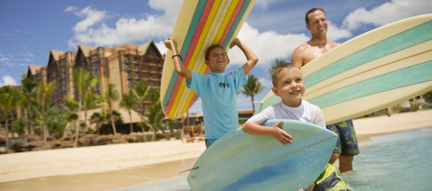 family surfing at aulani